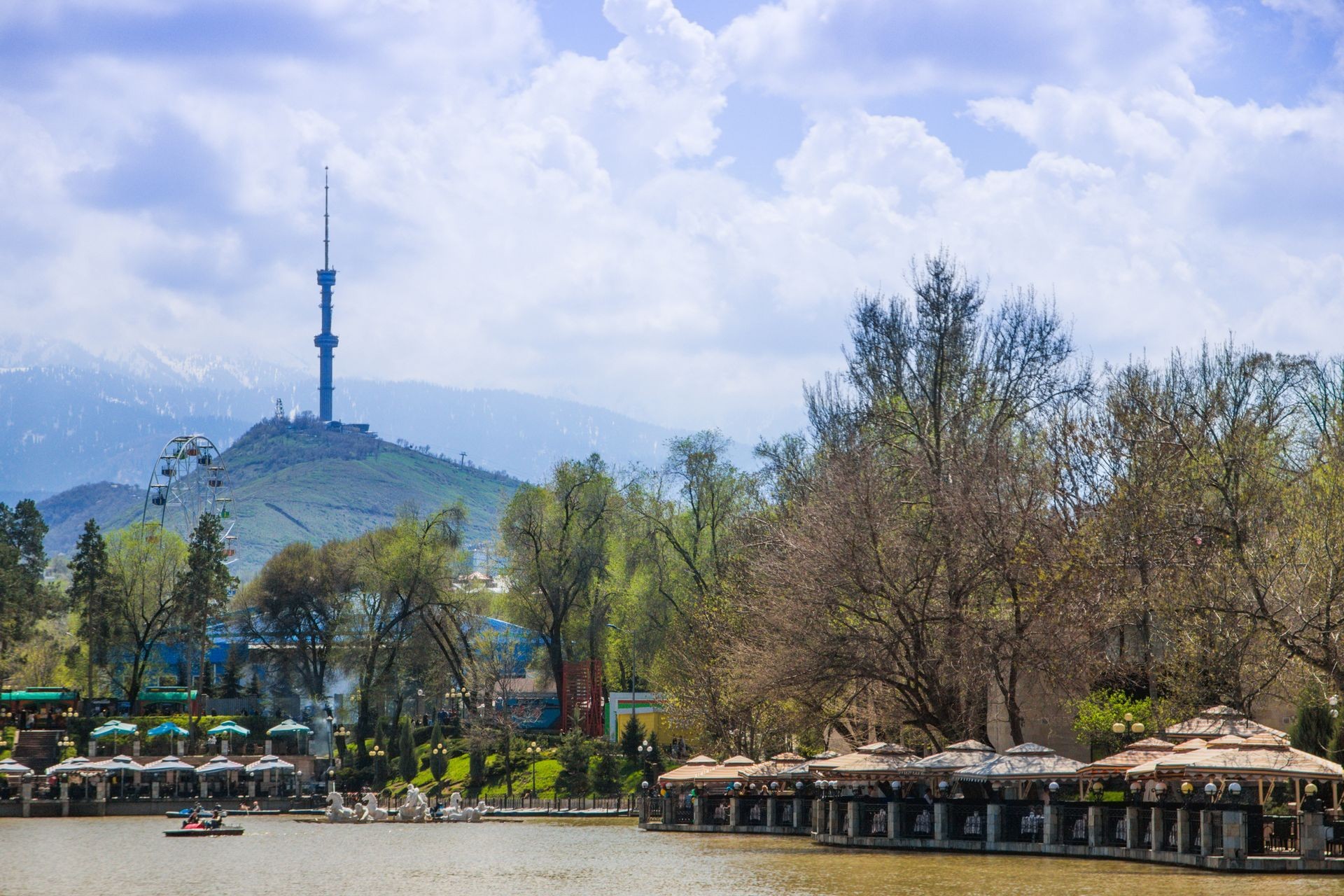 Central City Park, Almaty, Kazakhstan. View of the lake and Kok tobe hill.